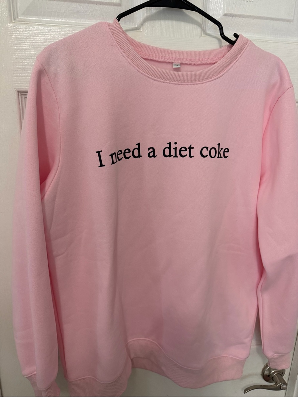Soft Pink Crewneck Sweatshirt with Black Text